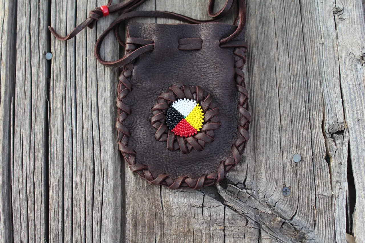 Beaded leather amulet bag with four directions beadwork