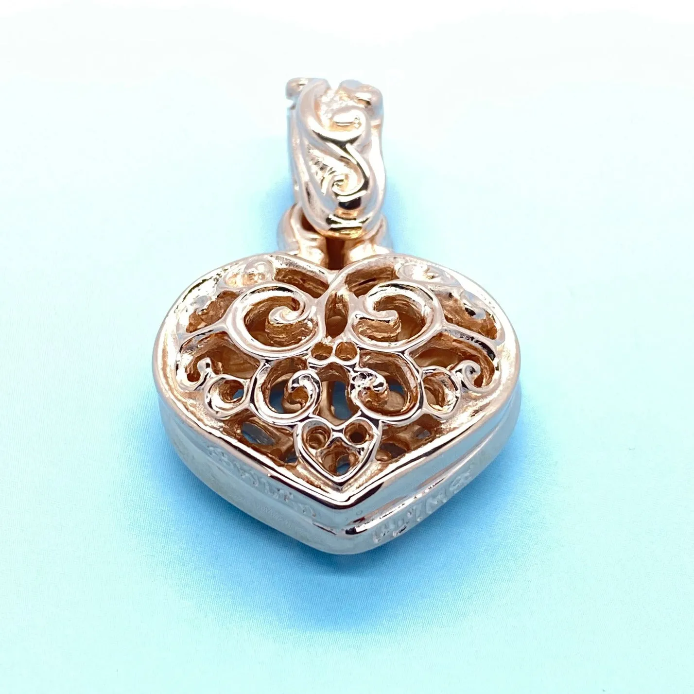 Double Tribal Heart Pendant with 18k Rose Gold Plating