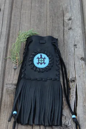 Fringed leather bag with beaded turtle totem