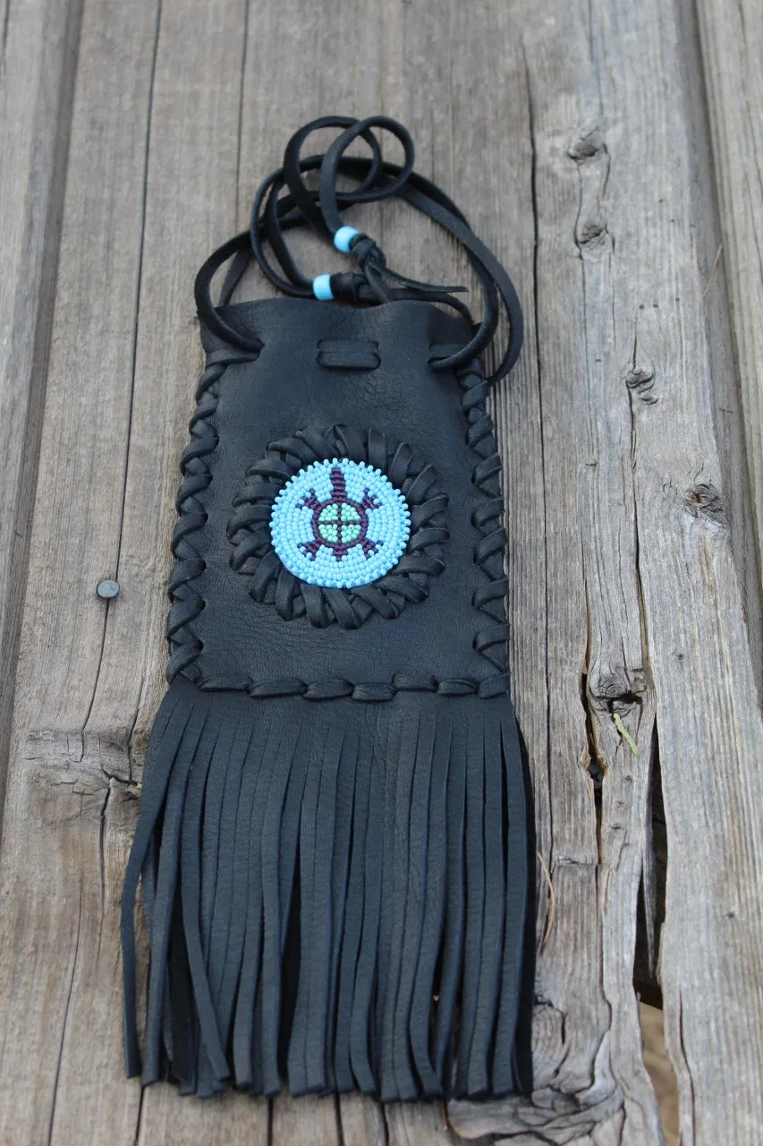 Fringed leather bag with beaded turtle totem