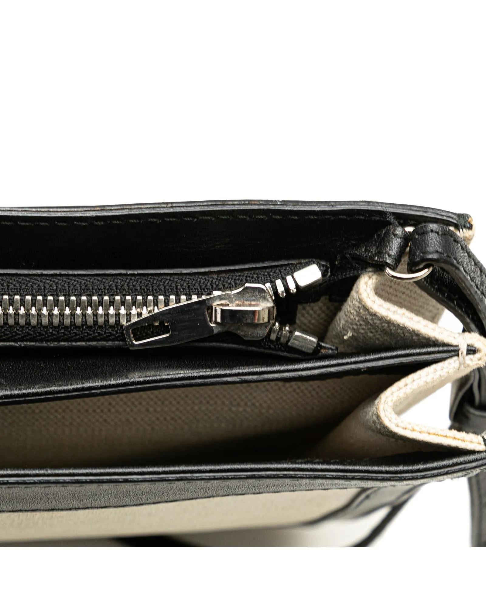 Pochette Crossbody Bag with Leather Trim and Top Zip Closure